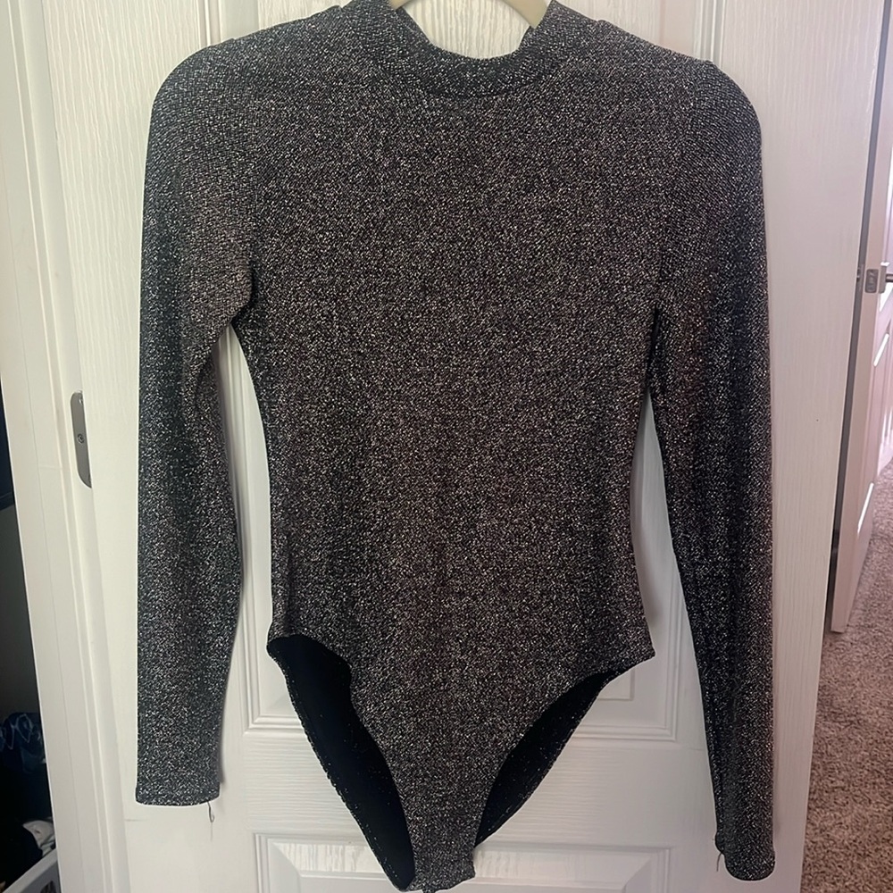 Semi sheer, silver high neck body suit with open back, size small